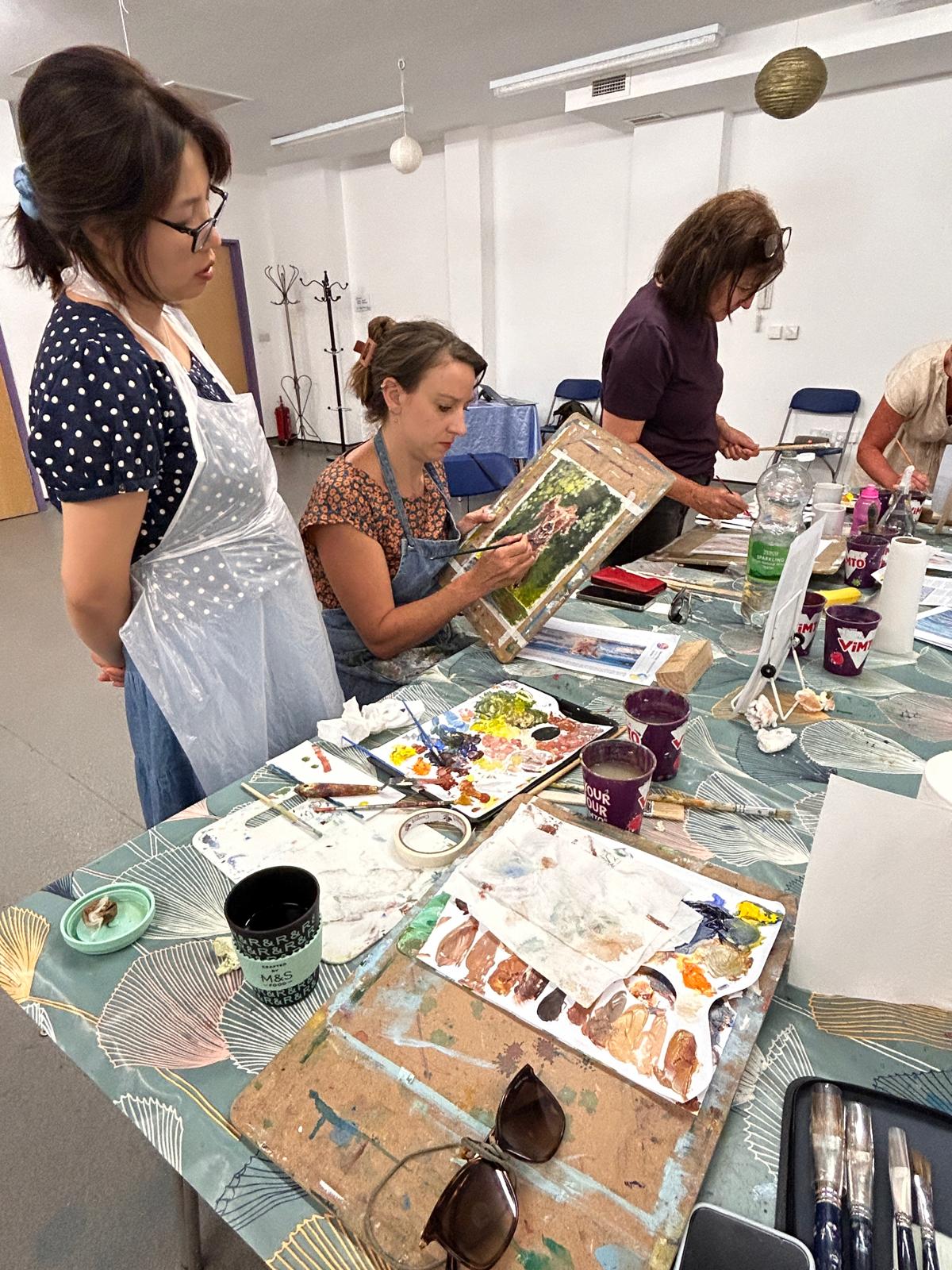 Students painting in class