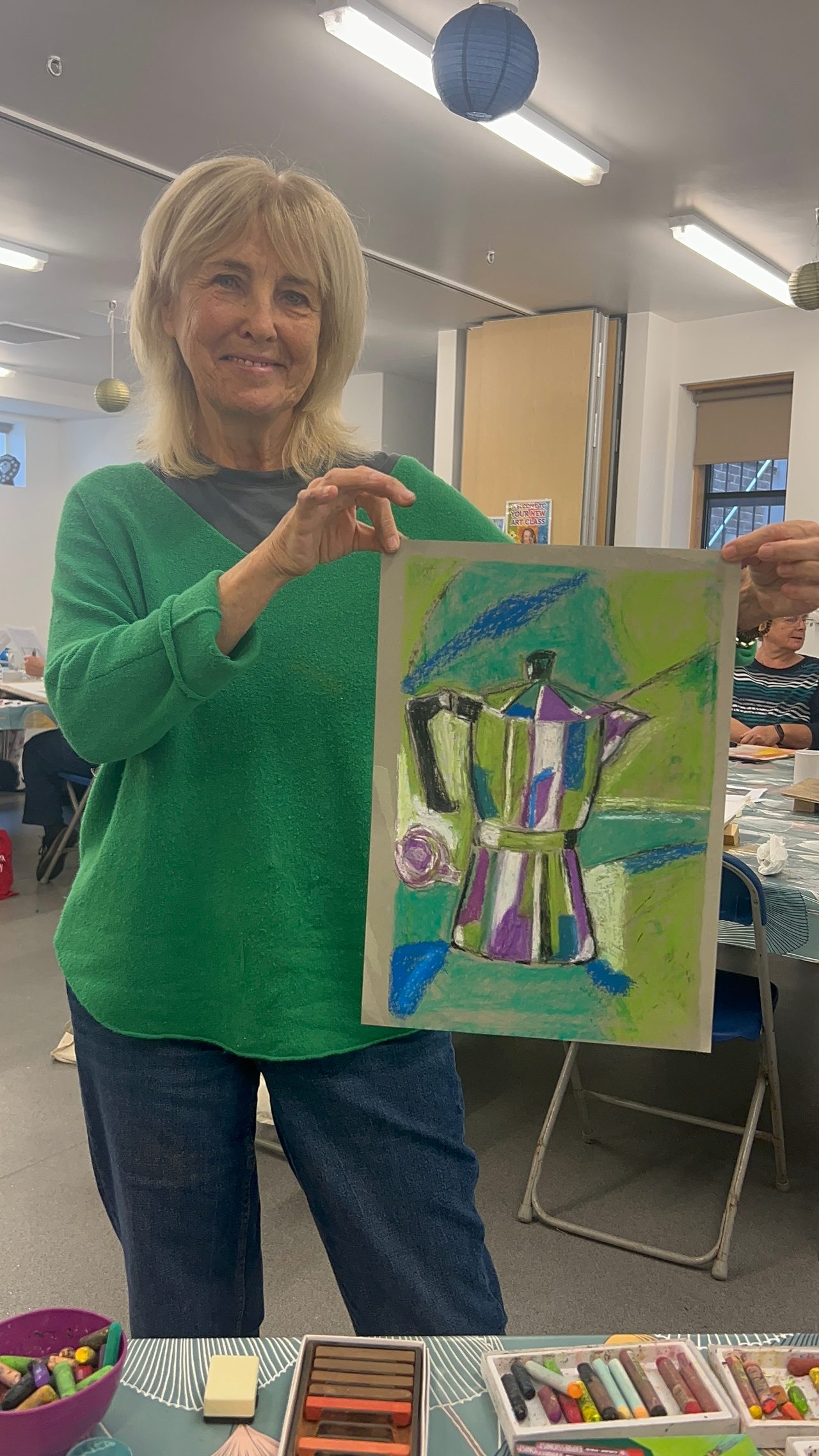 Students painting in class