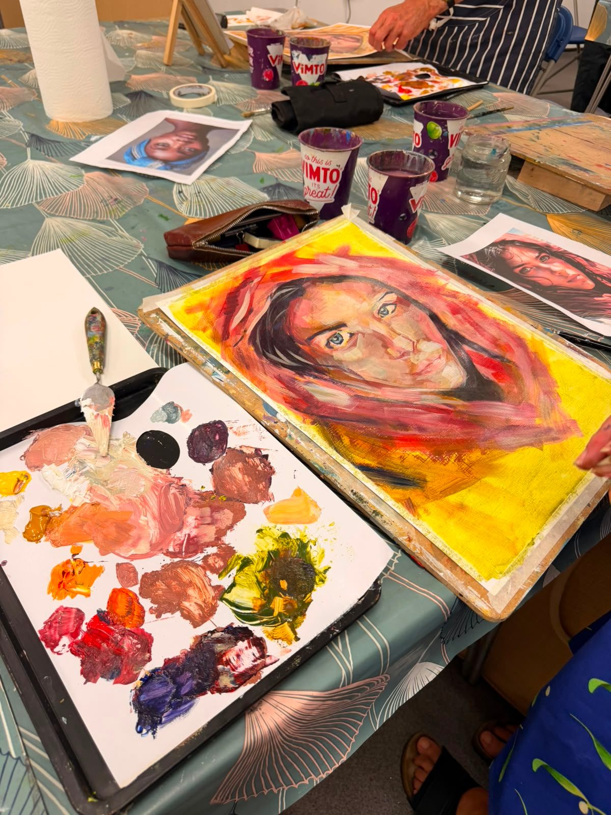 Students painting in class