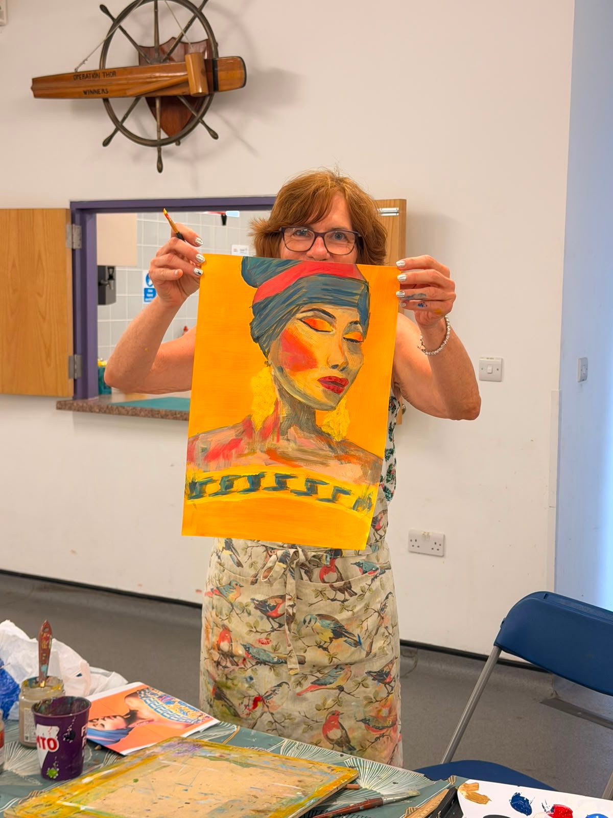 Students painting in class