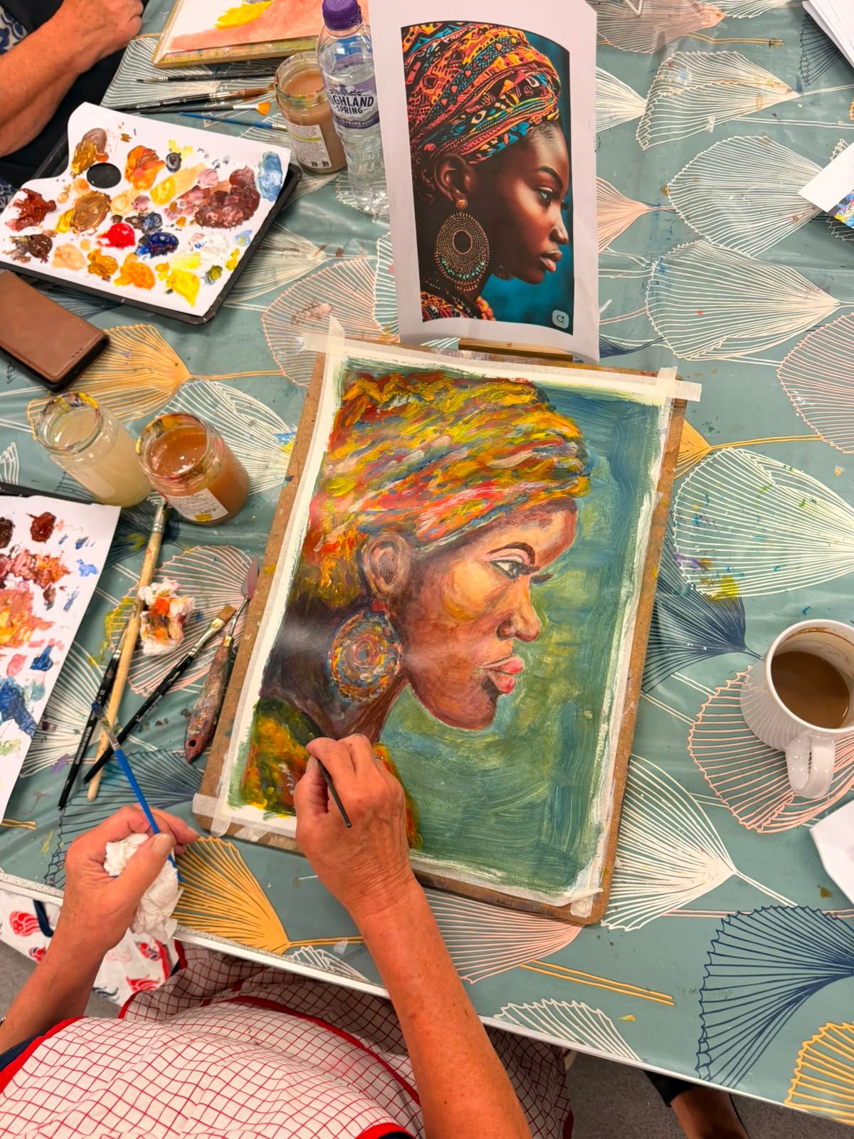 Students painting in class